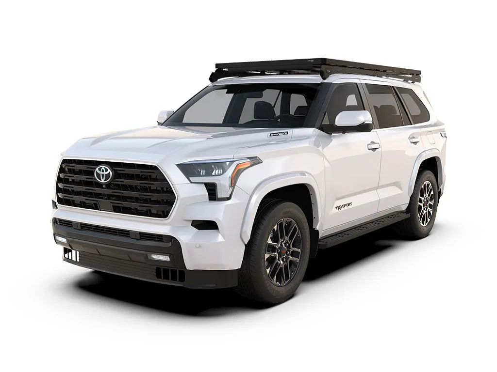 Toyota 4WD SUV with fishing rods and surfboard mounted on hood and